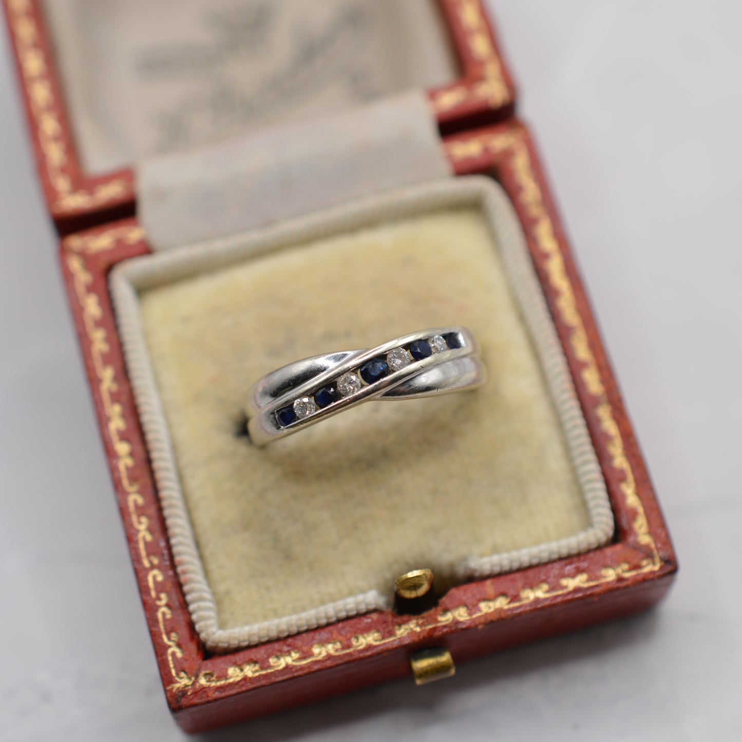 9ct White Gold Sapphire & Diamond Crossover Half-Eternity Ring