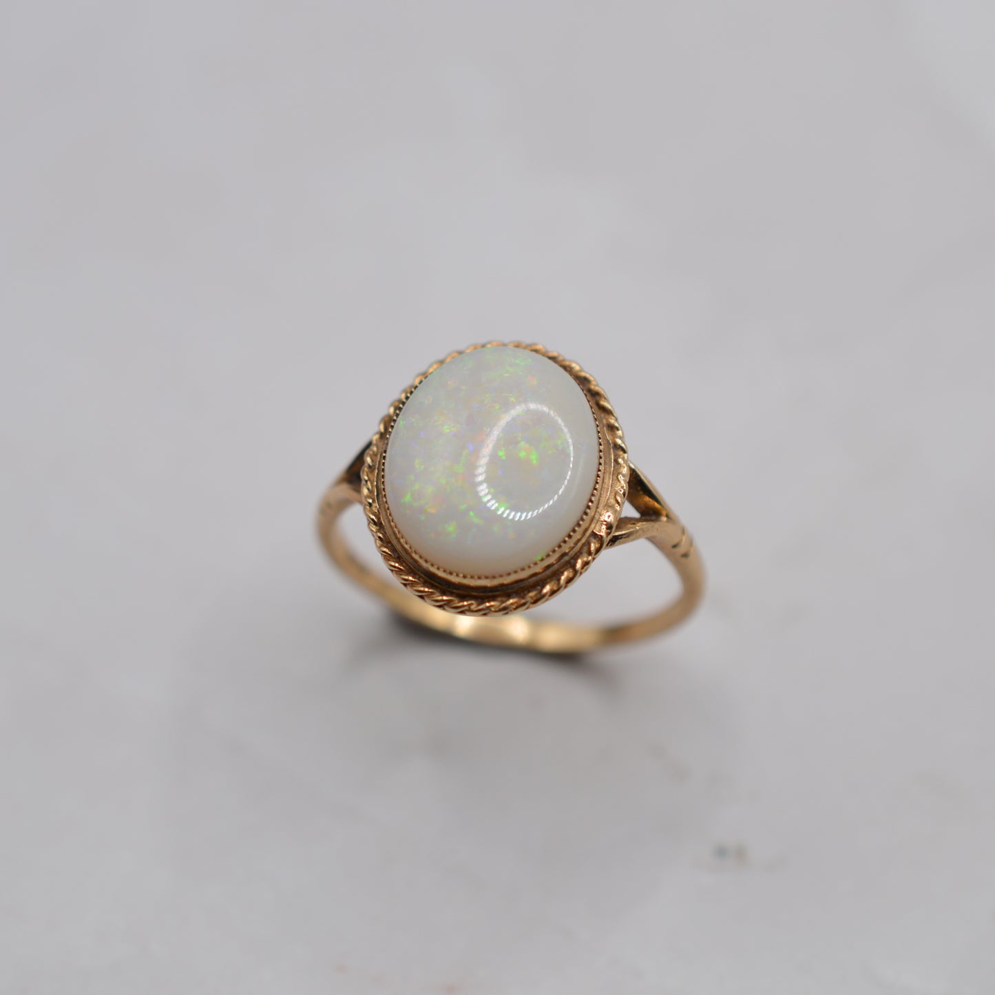1980s Vintage 9ct Gold Opal Ring with Rope-Twist Border