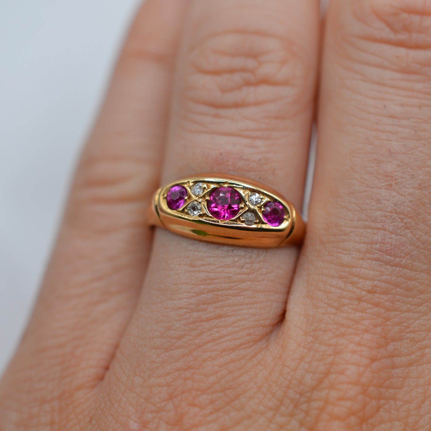 Antique 1910s 18ct Gold Ruby & Diamond Seven-Stone Ring