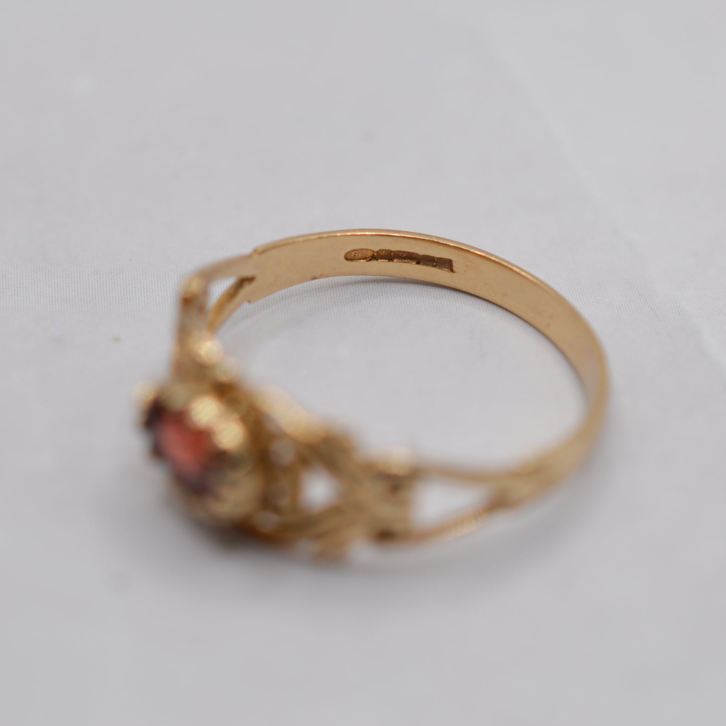 9ct Gold Garnet Open-Work Swirl Ring