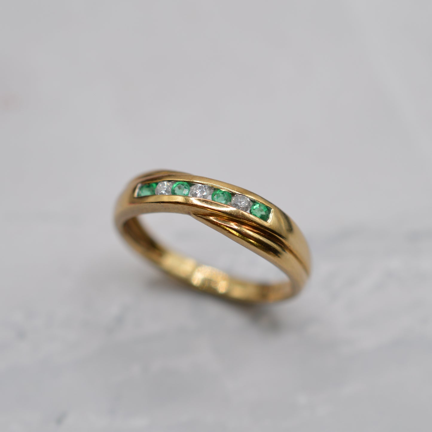 9ct Gold Emerald & Diamond Crossover Half-Eternity Ring