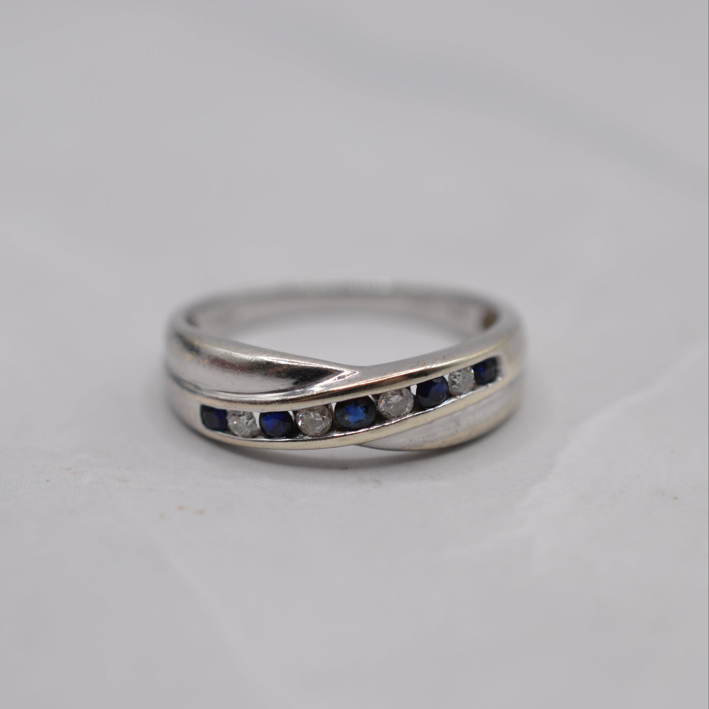 9ct White Gold Sapphire & Diamond Crossover Half-Eternity Ring