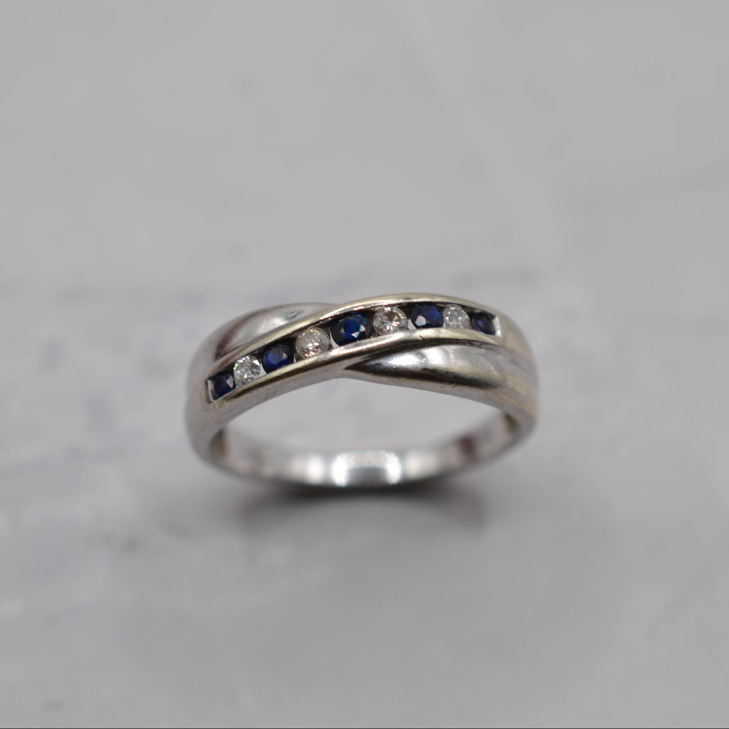 9ct White Gold Sapphire & Diamond Crossover Half-Eternity Ring