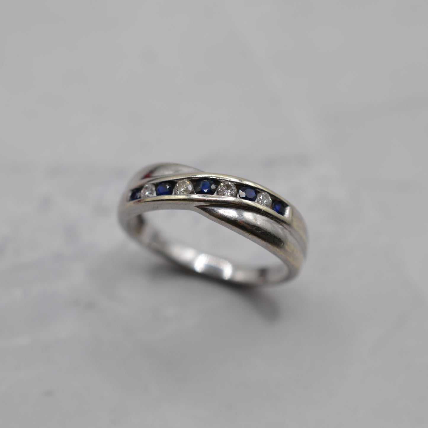 9ct White Gold Sapphire & Diamond Crossover Half-Eternity Ring