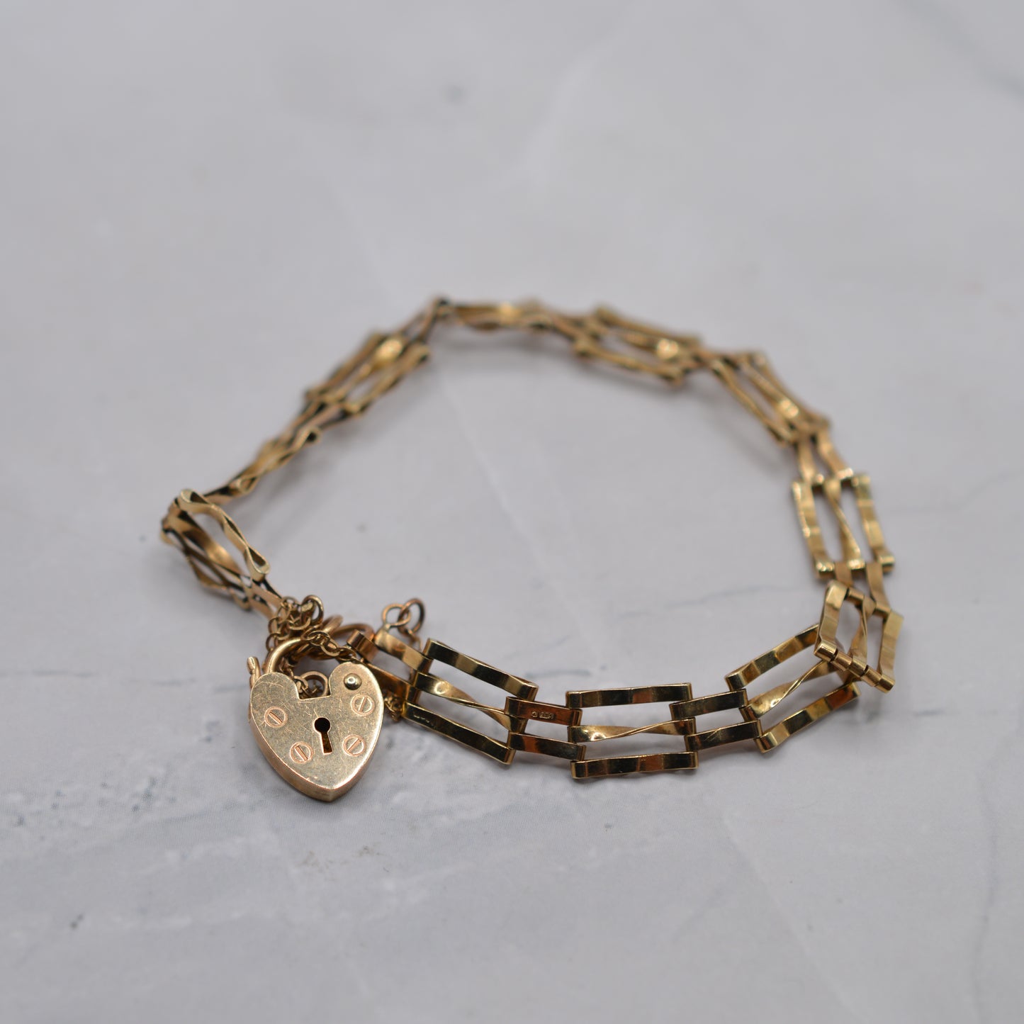 1980s 9ct Gold Three-Bar Gate Bracelet with Heart Padlock (7.5”) 