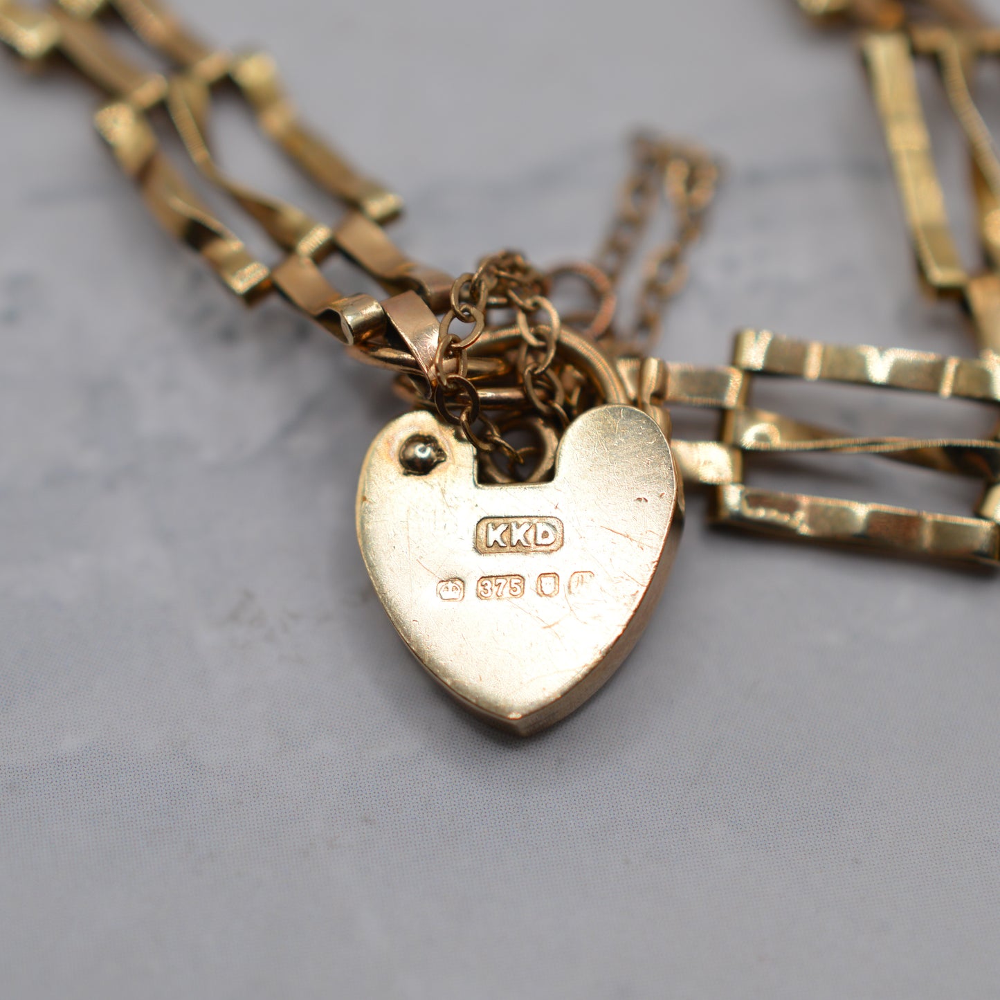 1980s 9ct Gold Three-Bar Gate Bracelet with Heart Padlock (7.5”) 