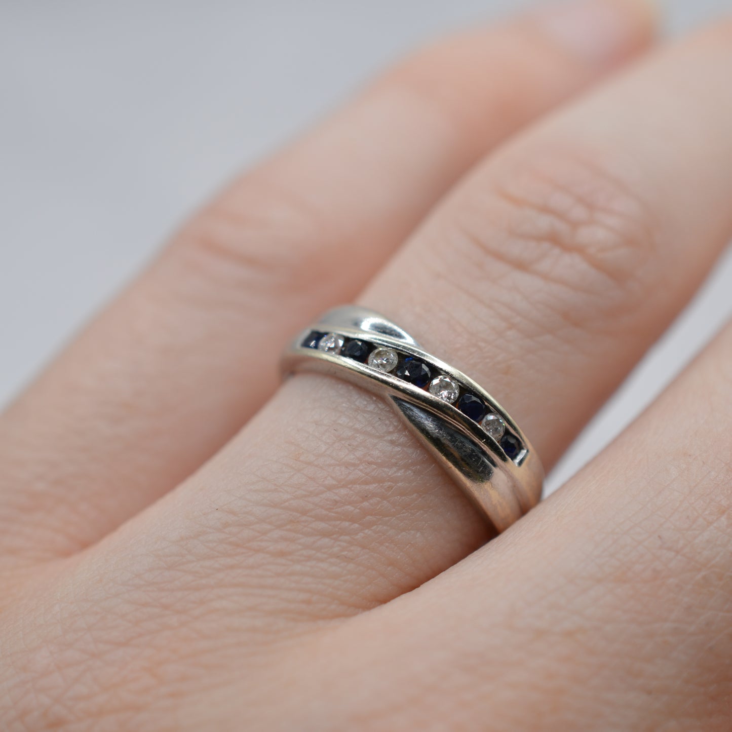 9ct White Gold Sapphire & Diamond Crossover Half-Eternity Ring