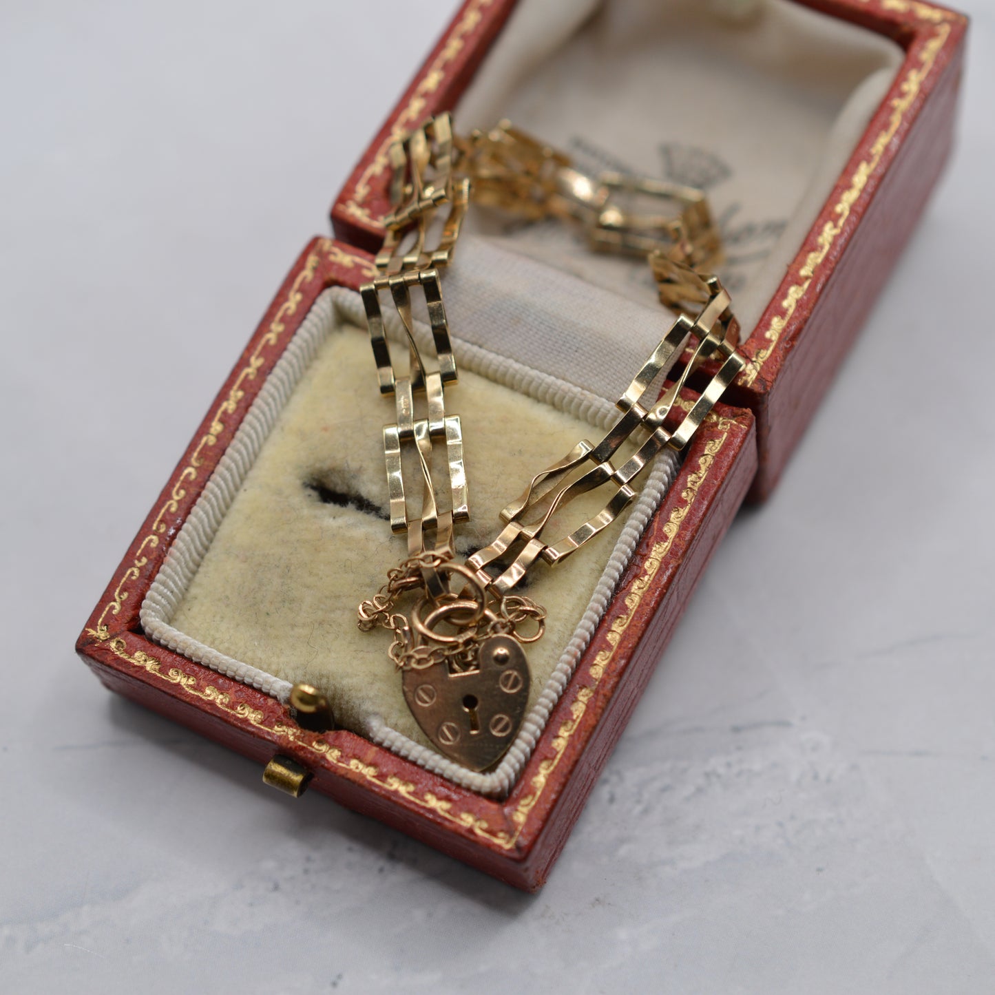 1980s 9ct Gold Three-Bar Gate Bracelet with Heart Padlock (7.5”) 