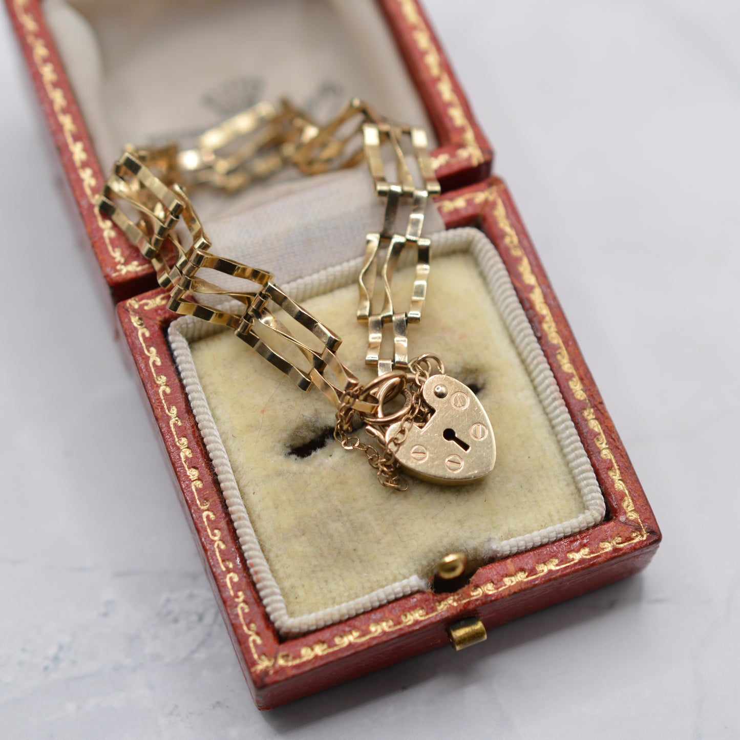 1980s 9ct Gold Three-Bar Gate Bracelet with Heart Padlock (7.5”) 