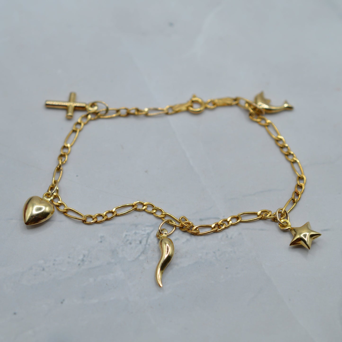 9ct Gold Five-Charm Figaro Bracelet (7”)