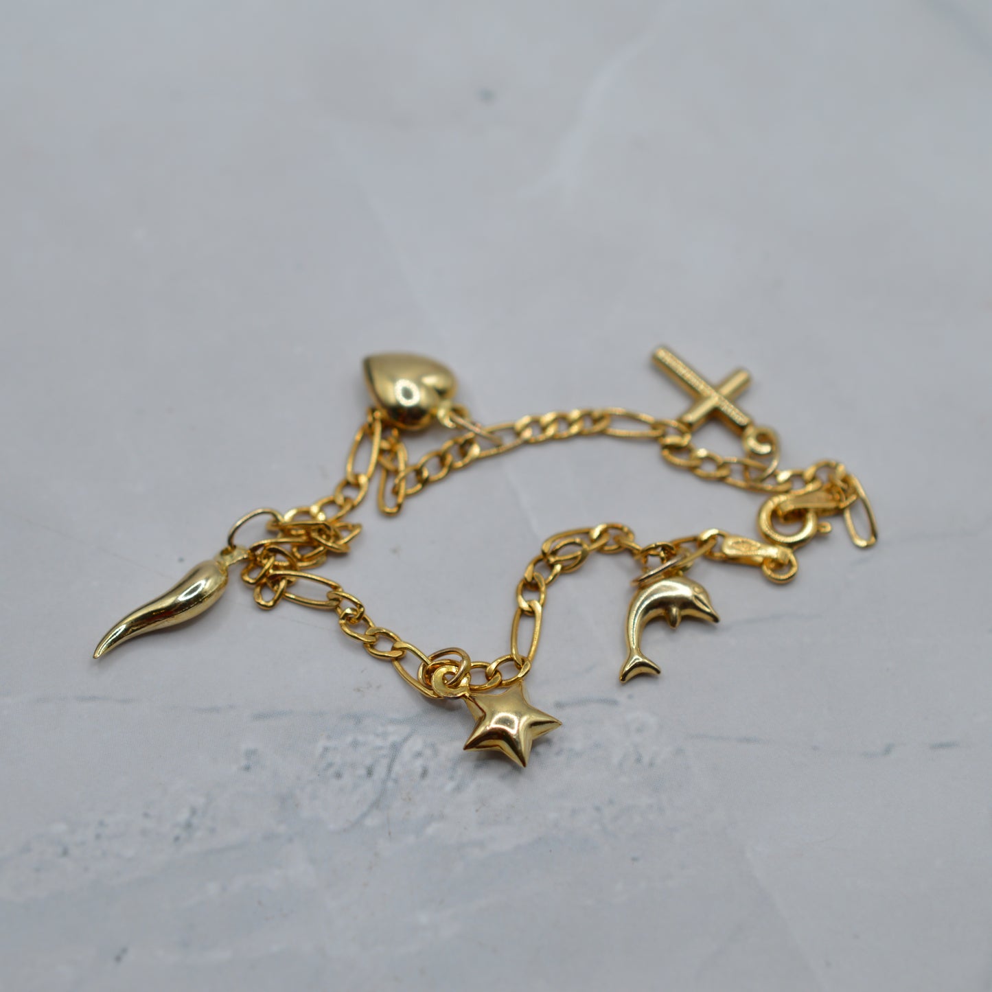 9ct Gold Five-Charm Figaro Bracelet (7”)