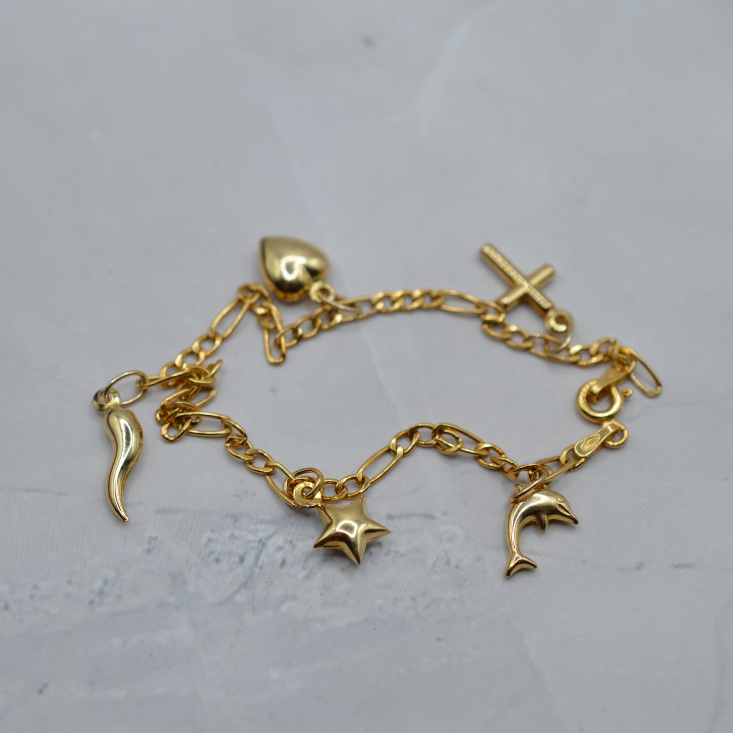 9ct Gold Five-Charm Figaro Bracelet (7”)