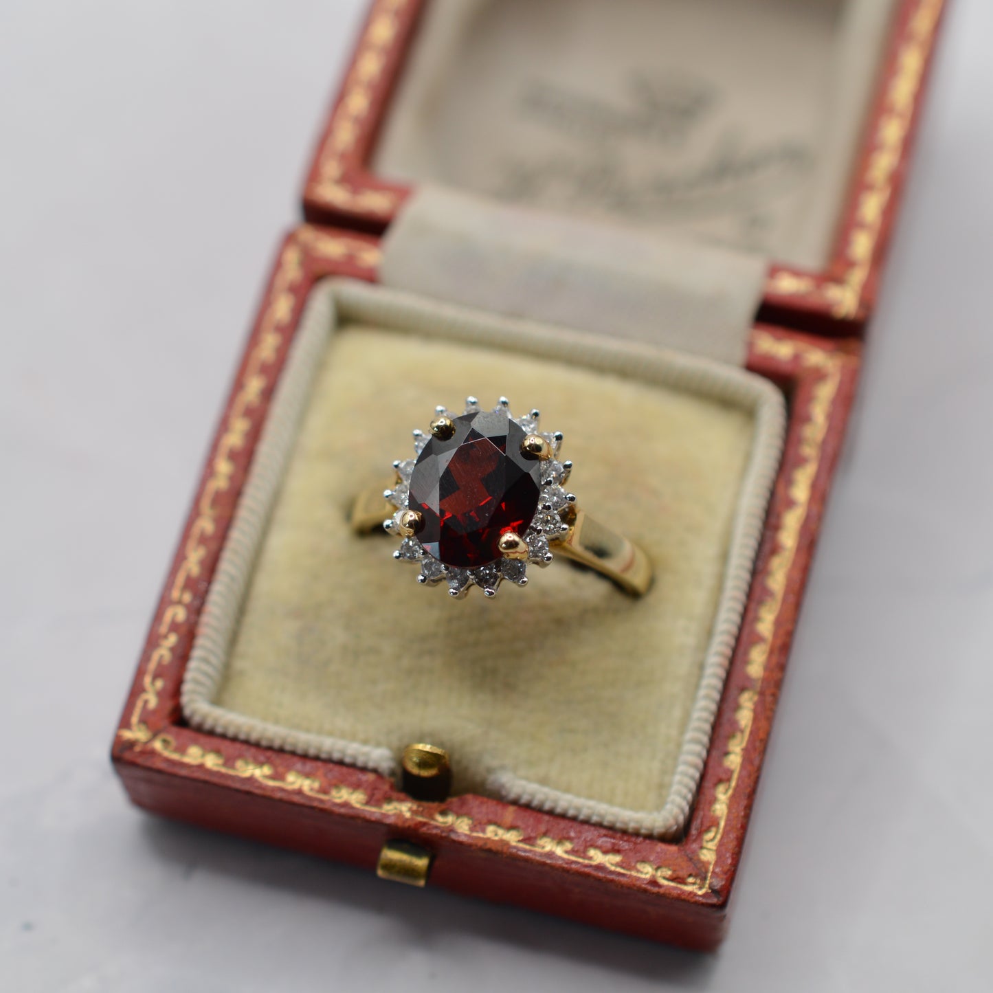 Y2K 9ct Gold Garnet & Diamond Halo Ring