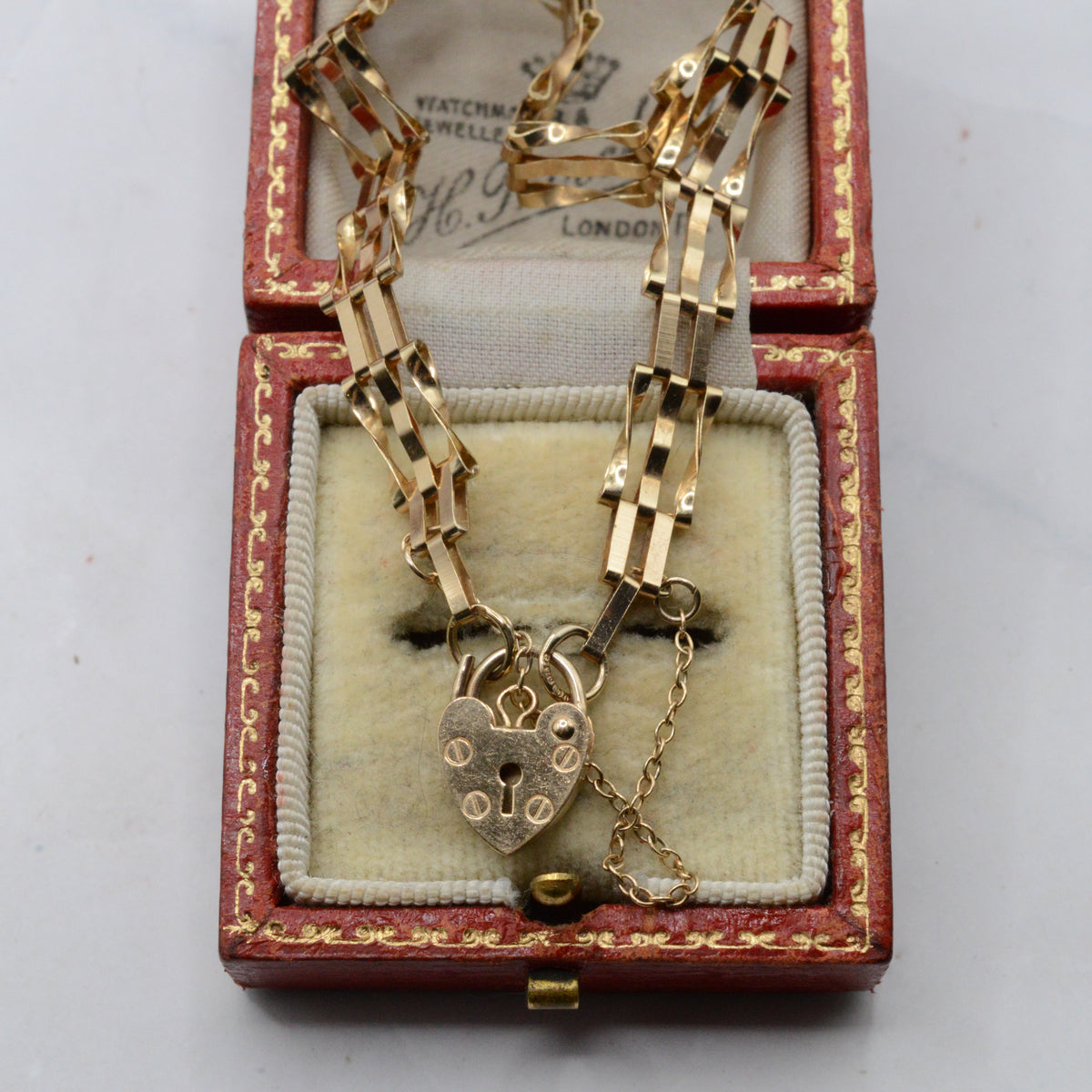 1980s 9ct Gold Three-Bar Gate Link Bracelet with Heart Padlock (7”)