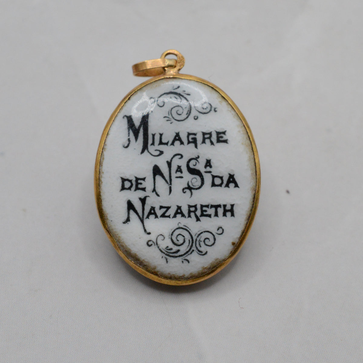 Portuguese 19.2ct Gold Enamel 'Our Lady of Nazaré' Pendant
