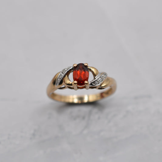 9ct Gold Garnet & Diamond Crossover Ring