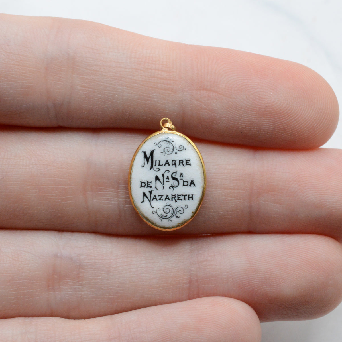 Portuguese 19.2ct Gold Enamel 'Our Lady of Nazaré' Pendant