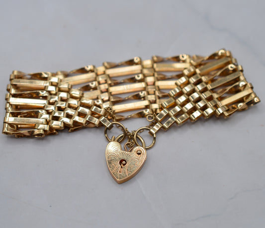 1970s Heavy Vintage 9ct Gold Seven-Bar Gate Bracelet with Heart Padlock (7”)