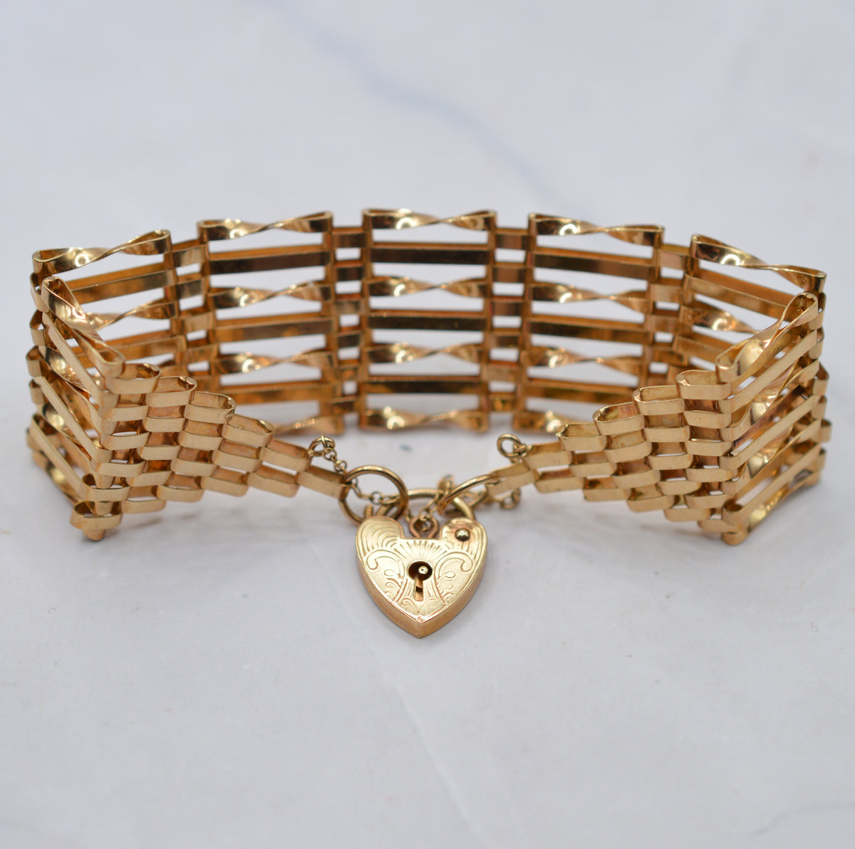 1970s Heavy Vintage 9ct Gold Seven-Bar Gate Bracelet with Heart Padlock (7”)