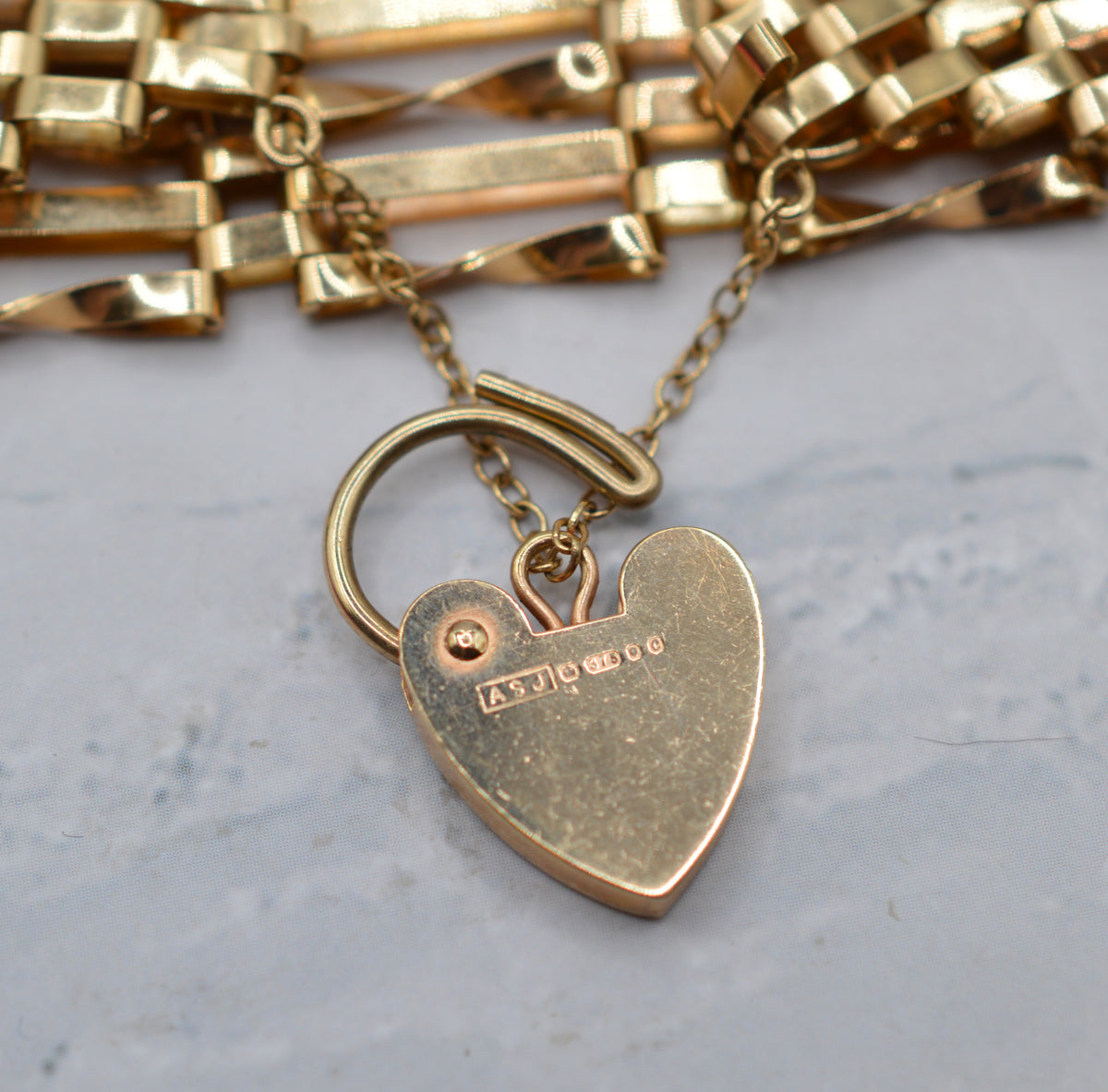 1970s Heavy Vintage 9ct Gold Seven-Bar Gate Bracelet with Heart Padlock (7”)