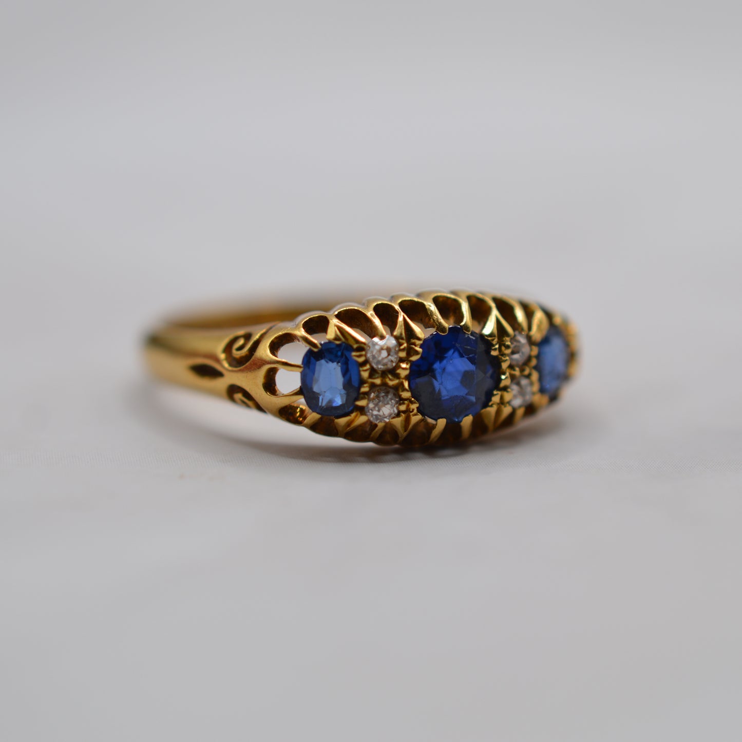 Antique 1911 18ct Gold Sapphire & Diamond Seven-Stone Ring