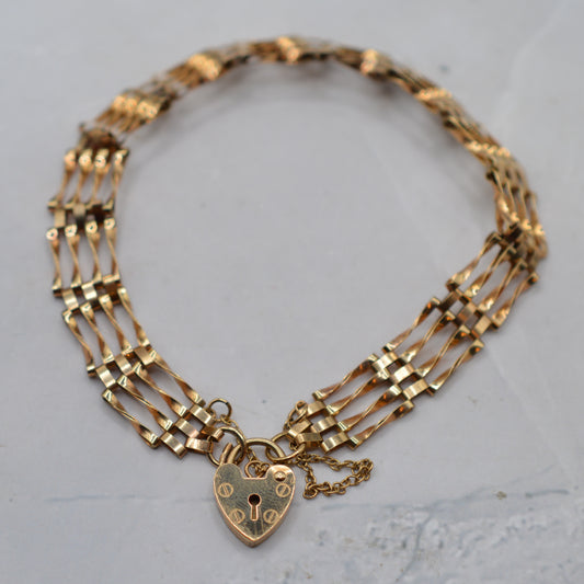 1990s Vintage 9ct Gold Four-Bar Gate Link Bracelet with Heart Padlock Clasp (7")