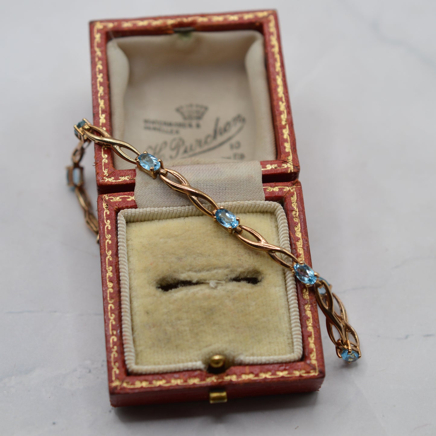 9ct Gold Blue Topaz Infinity Link Bracelet (7.5")