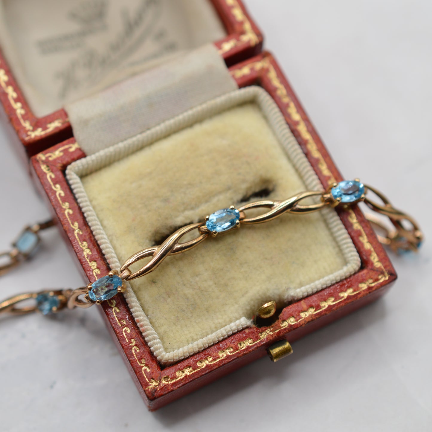 9ct Gold Blue Topaz Infinity Link Bracelet (7.5")