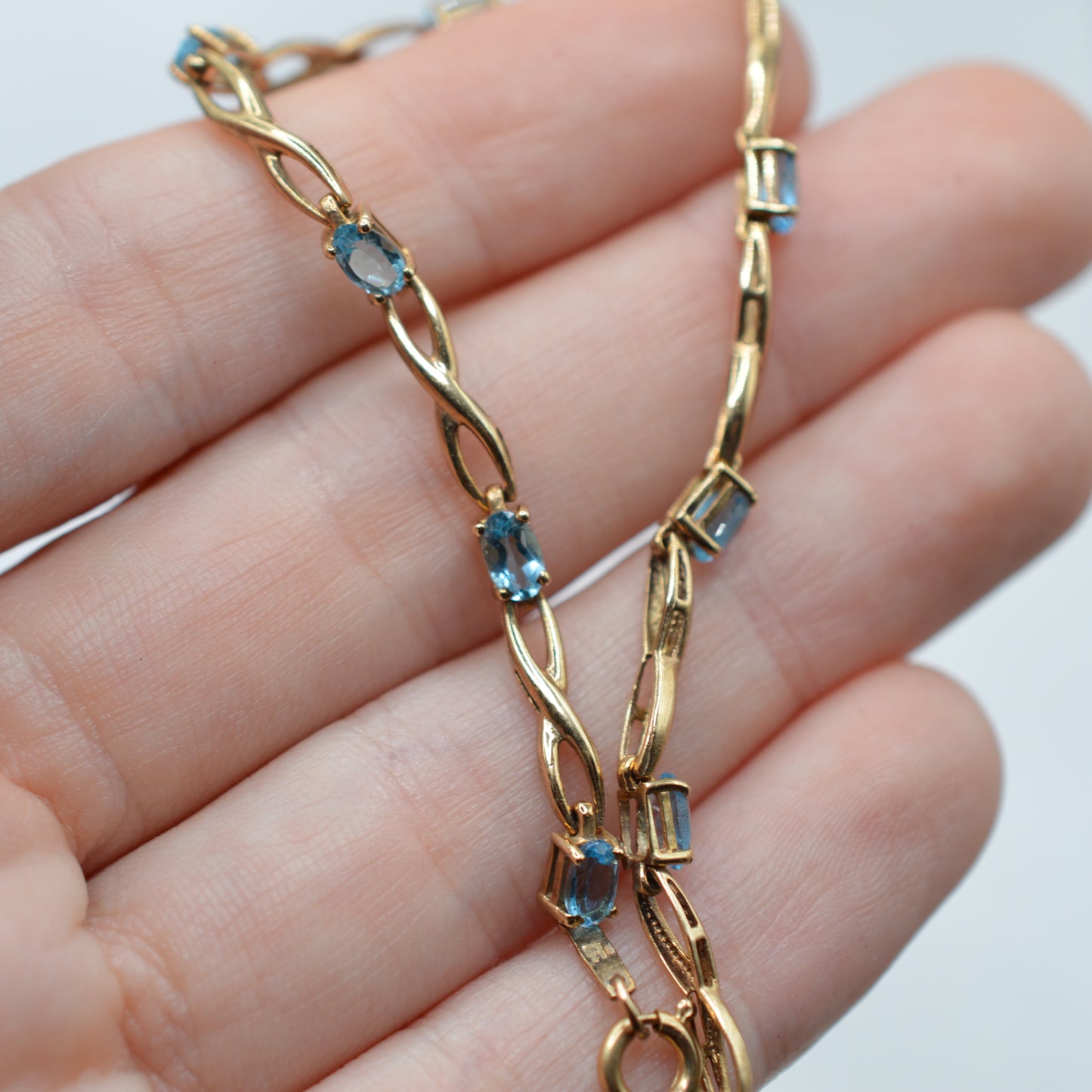 9ct Gold Blue Topaz Infinity Link Bracelet (7.5")