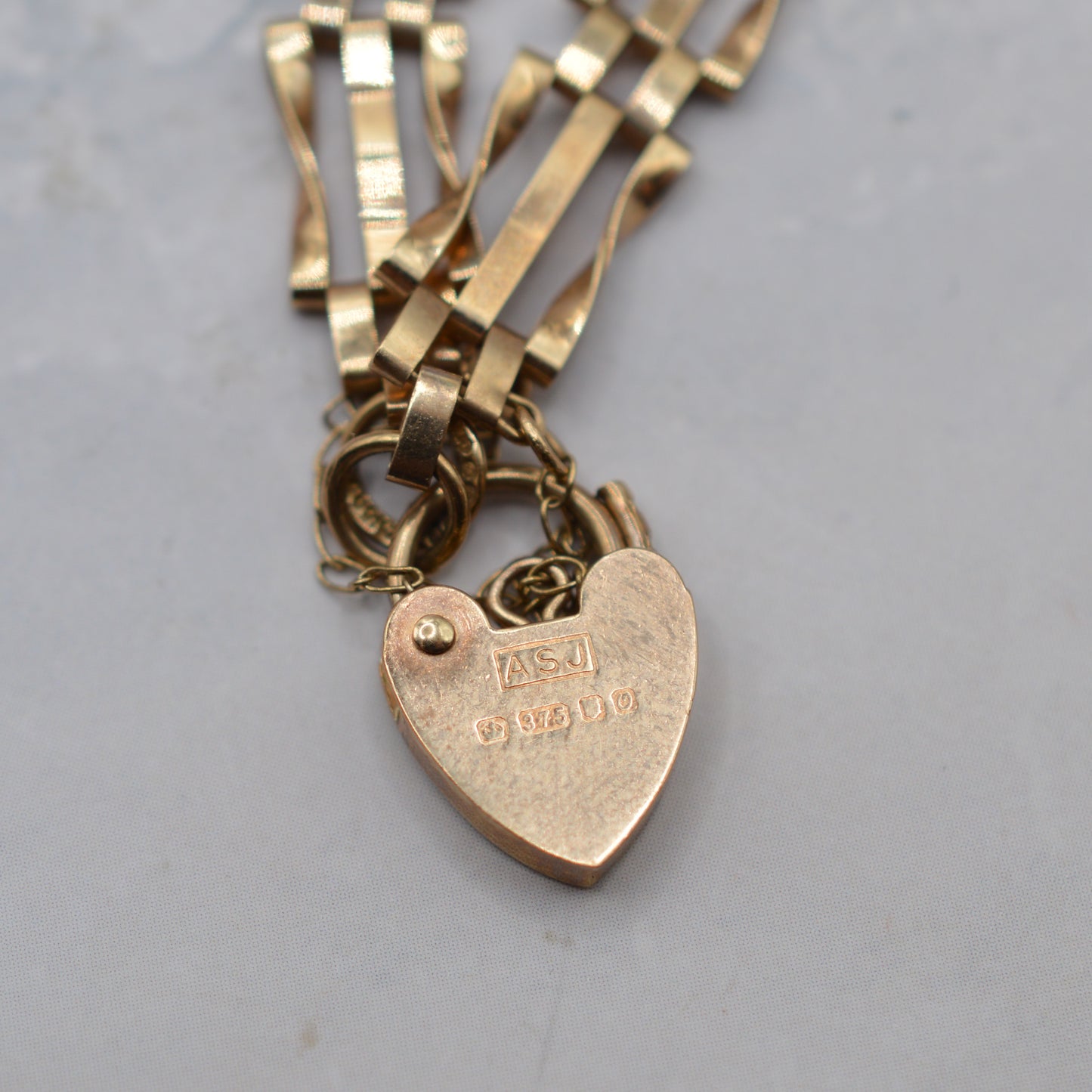 1980s 9ct Gold Three-Bar Gate Link Bracelet with Heart Padlock (7”)