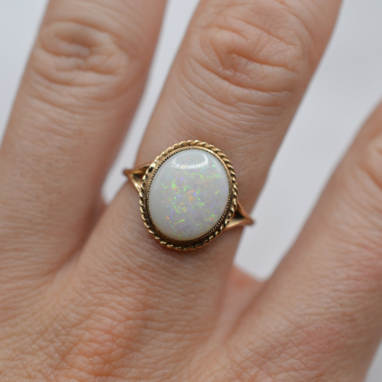 1980s Vintage 9ct Gold Opal Ring with Rope-Twist Border