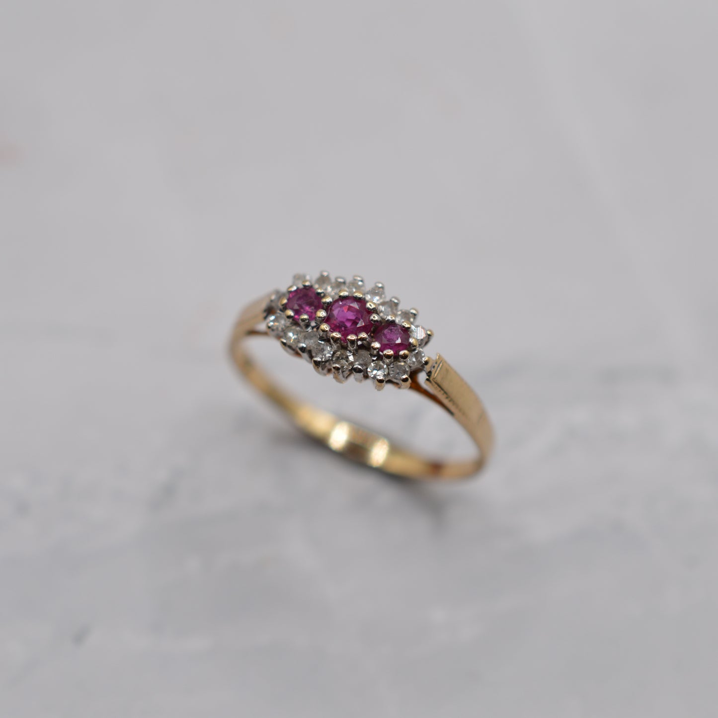 1990s 9ct Gold Ruby & Diamond Triple Halo Ring
