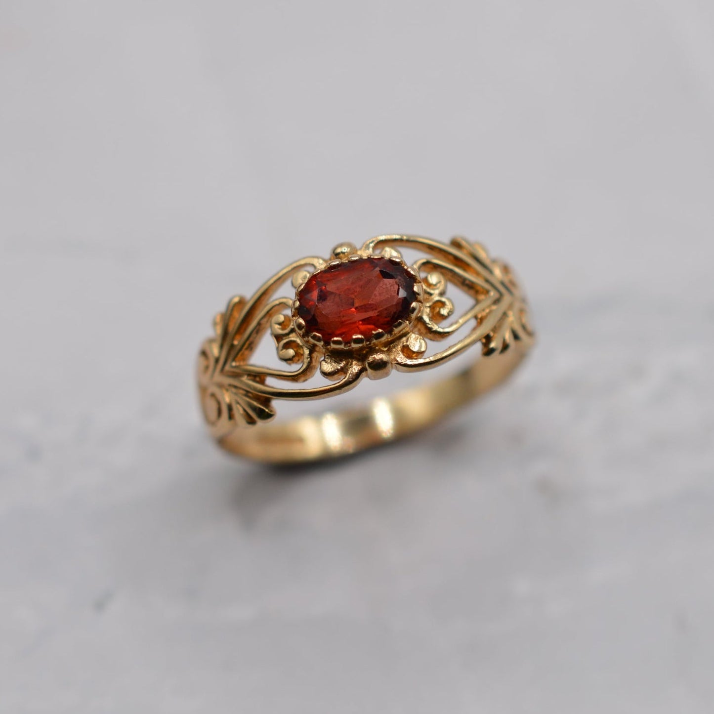 9ct Gold Garnet Open-Work Swirl Ring