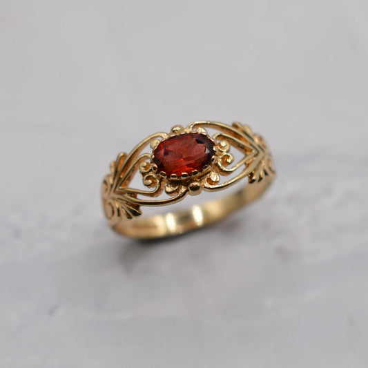 9ct Gold Garnet Open-Work Swirl Ring