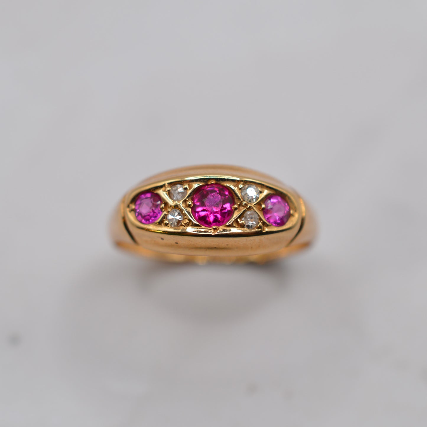 Antique 1910s 18ct Gold Ruby & Diamond Seven-Stone Ring