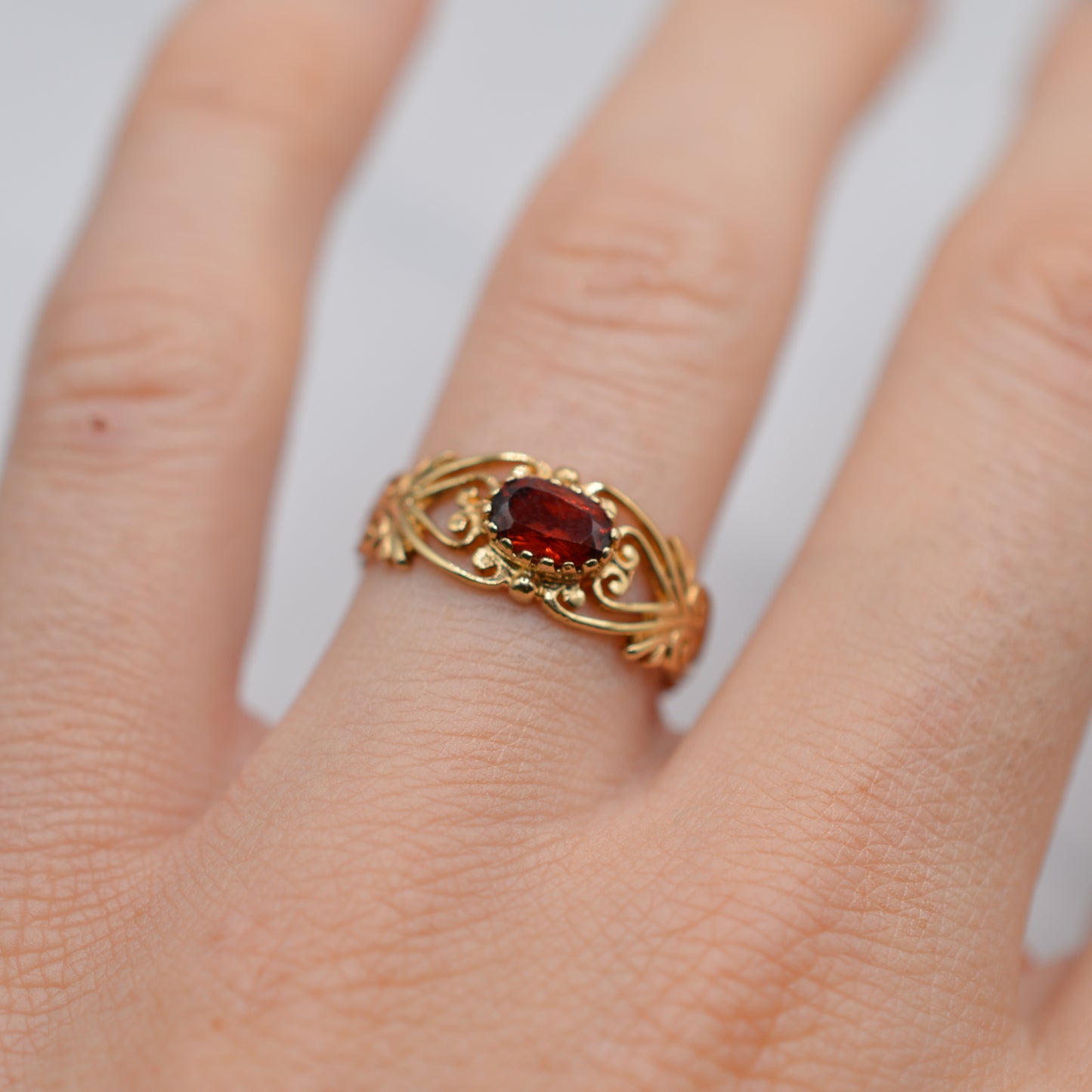 9ct Gold Garnet Open-Work Swirl Ring
