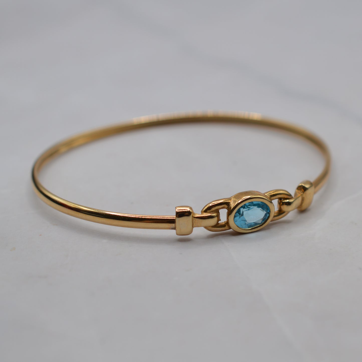 9ct Gold Blue Topaz Solitaire Bangle Bracelet