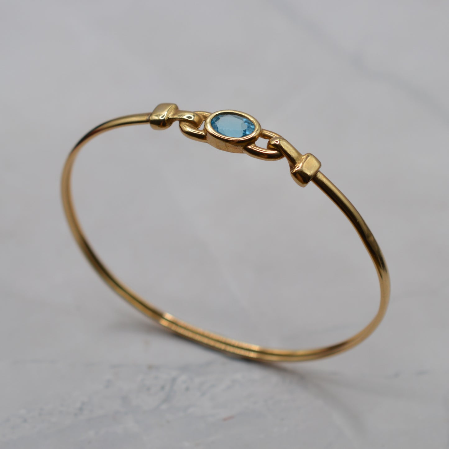 9ct Gold Blue Topaz Solitaire Bangle Bracelet