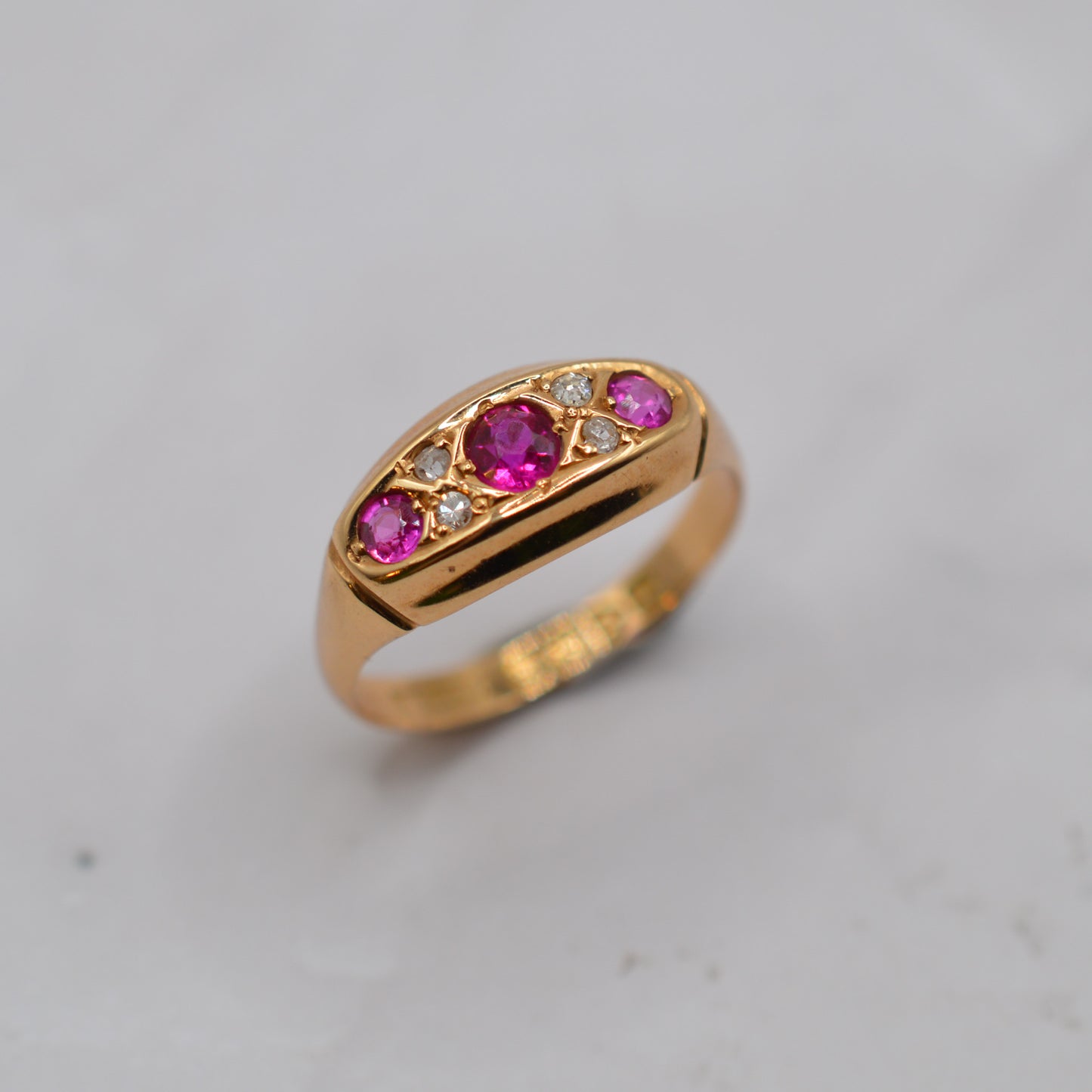 Antique 1910s 18ct Gold Ruby & Diamond Seven-Stone Ring