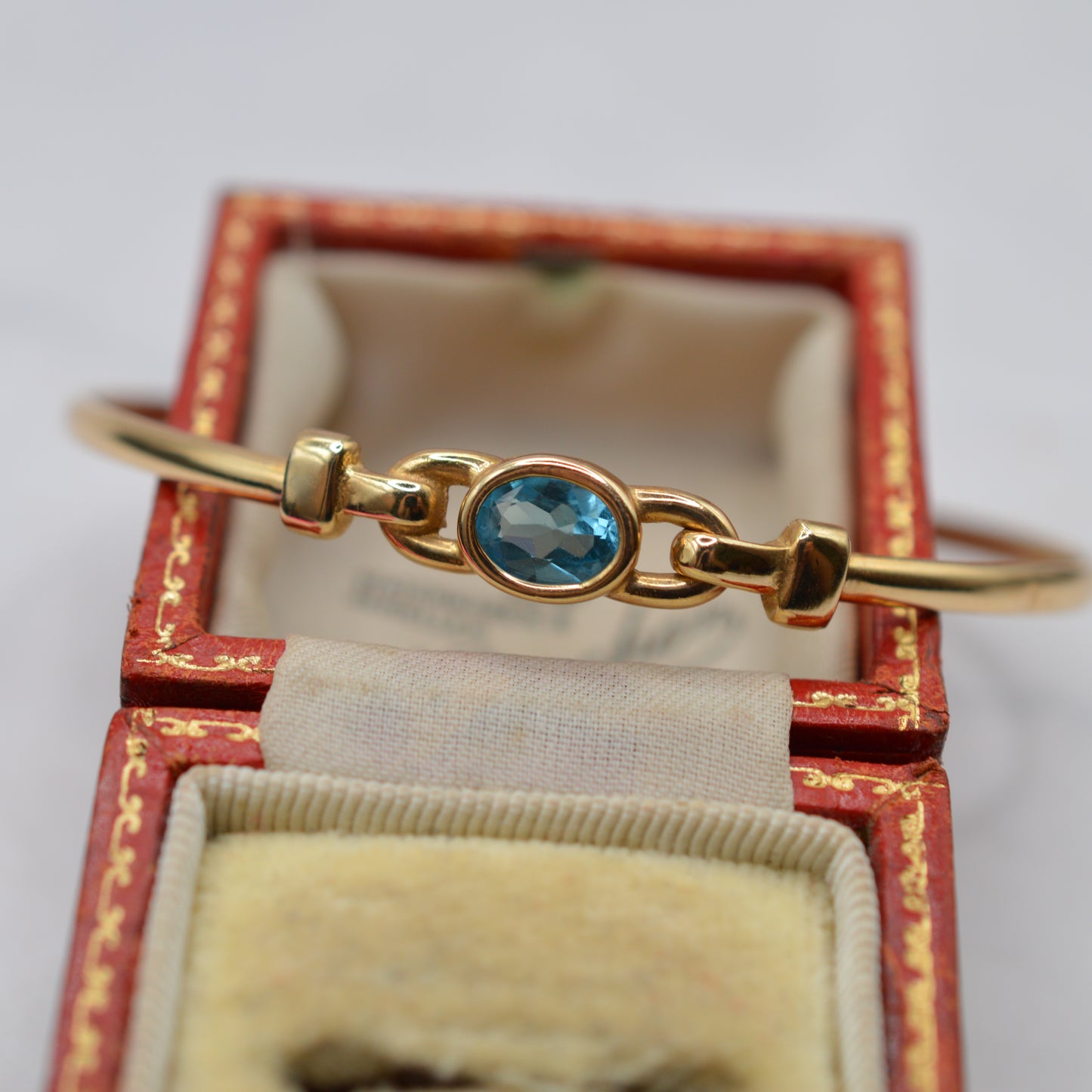 9ct Gold Blue Topaz Solitaire Bangle Bracelet