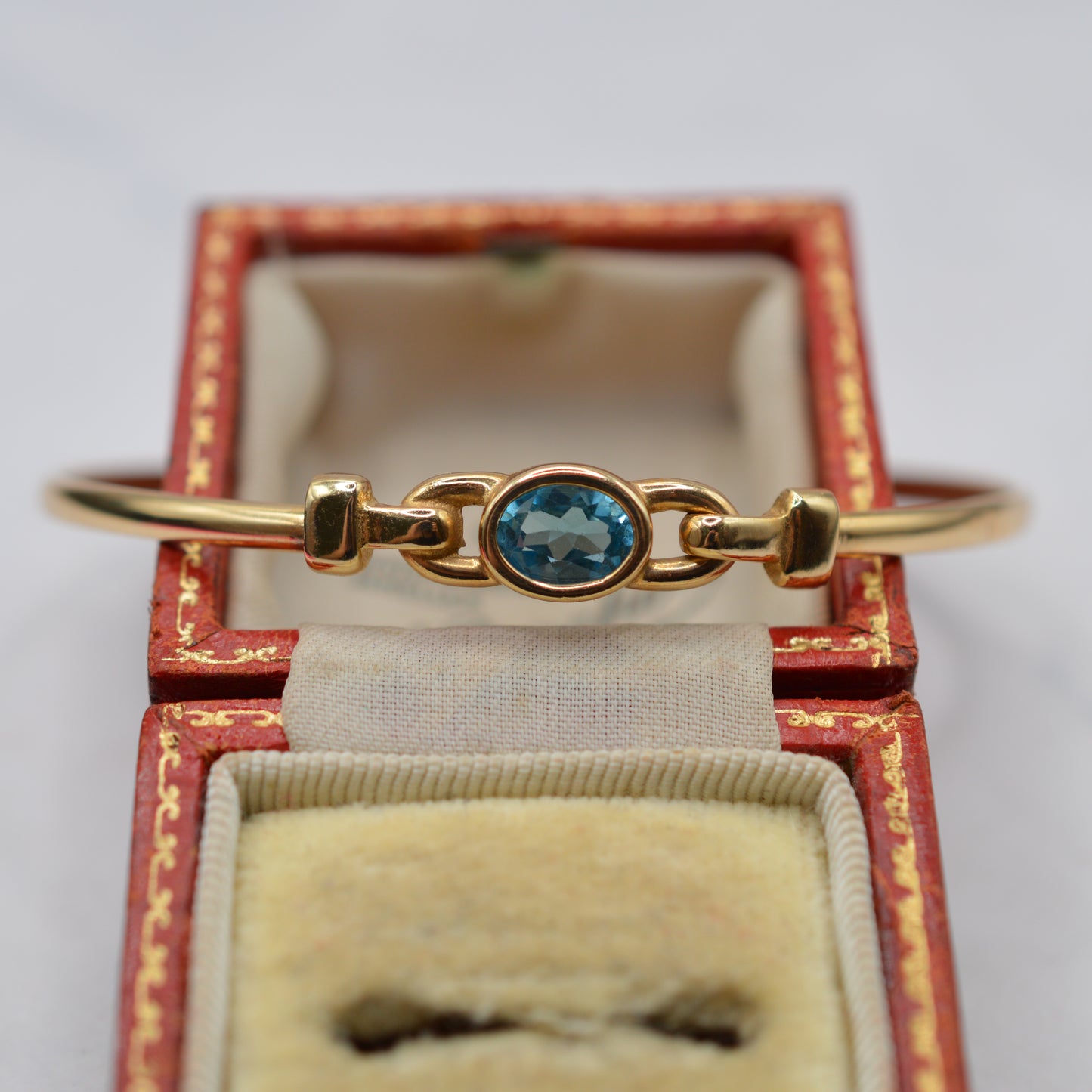 9ct Gold Blue Topaz Solitaire Bangle Bracelet