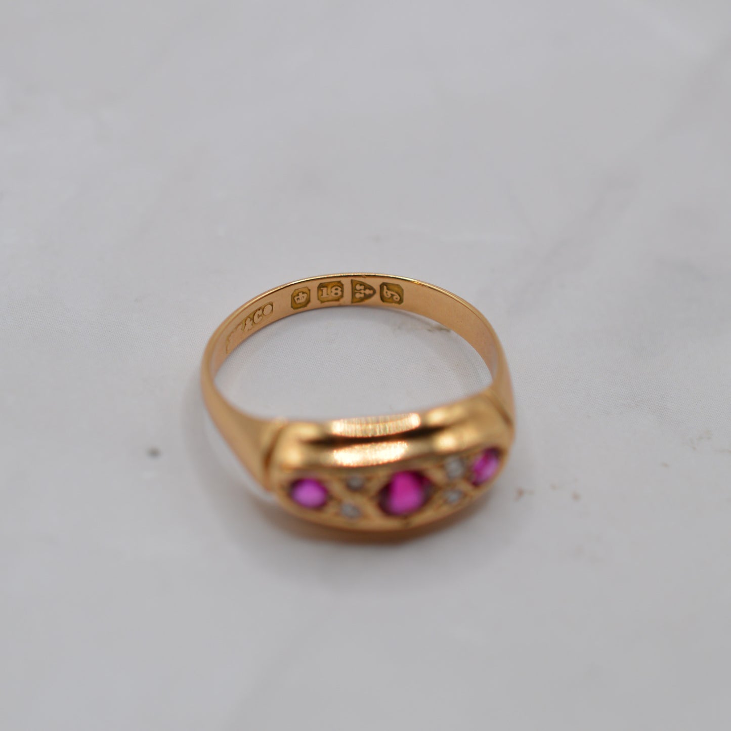 Antique 1910s 18ct Gold Ruby & Diamond Seven-Stone Ring