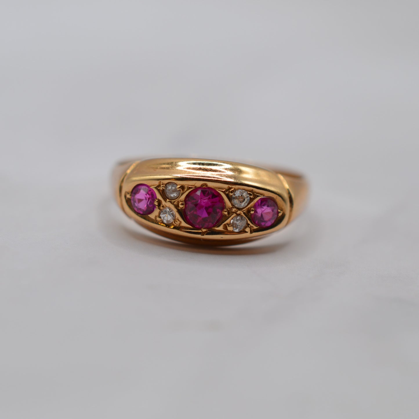 Antique 1910s 18ct Gold Ruby & Diamond Seven-Stone Ring