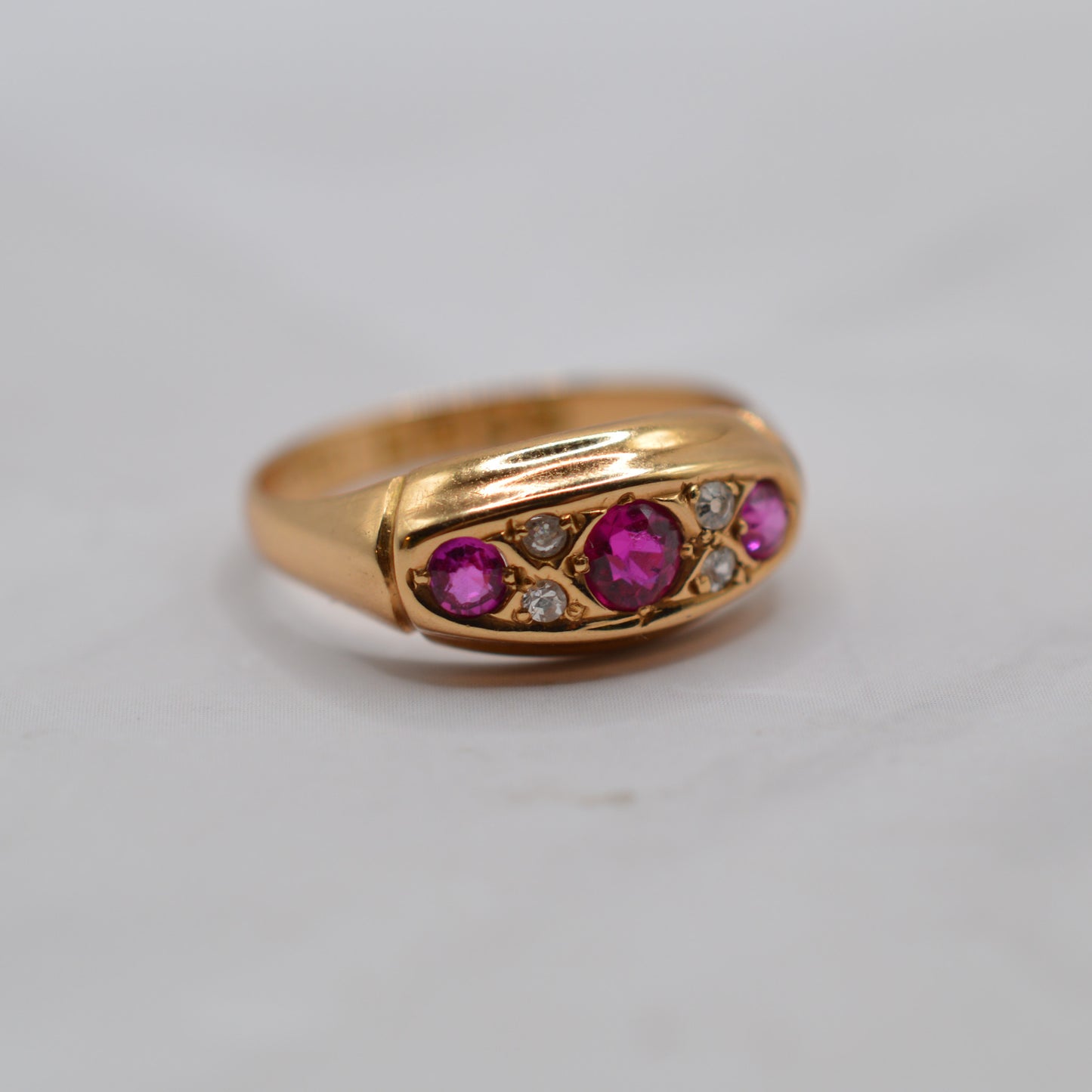 Antique 1910s 18ct Gold Ruby & Diamond Seven-Stone Ring