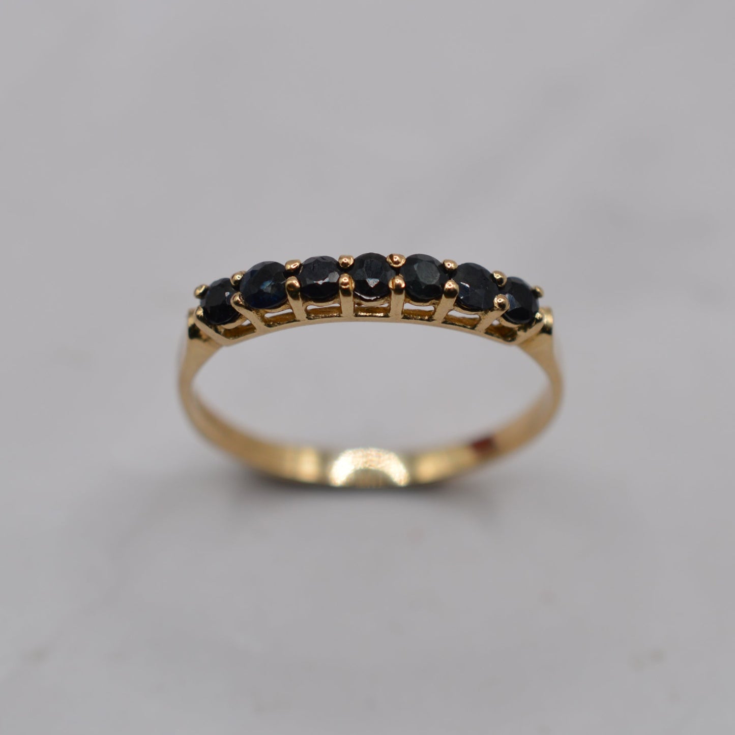 1990s 9ct Gold Sapphire Seven-Stone Half-Eternity Ring