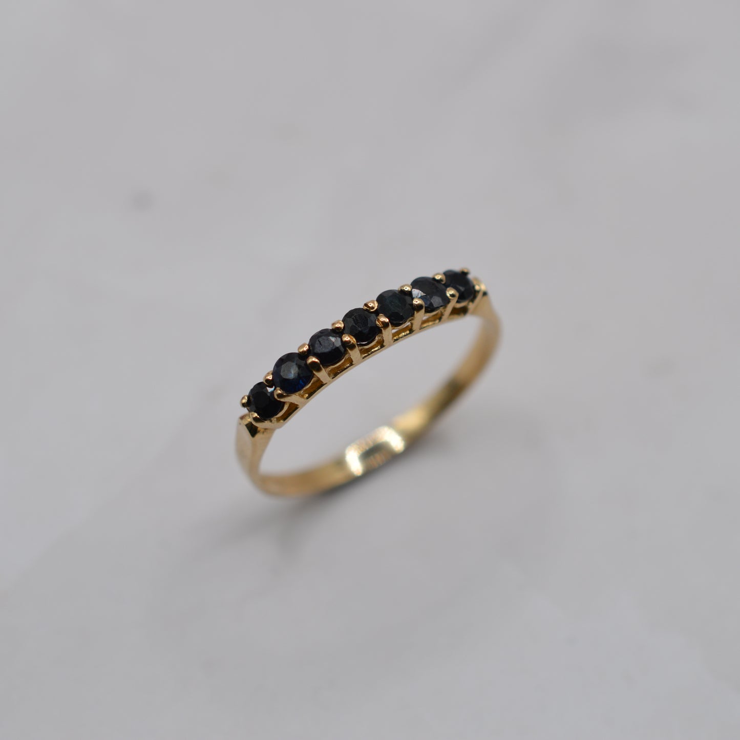 1990s 9ct Gold Sapphire Seven-Stone Half-Eternity Ring