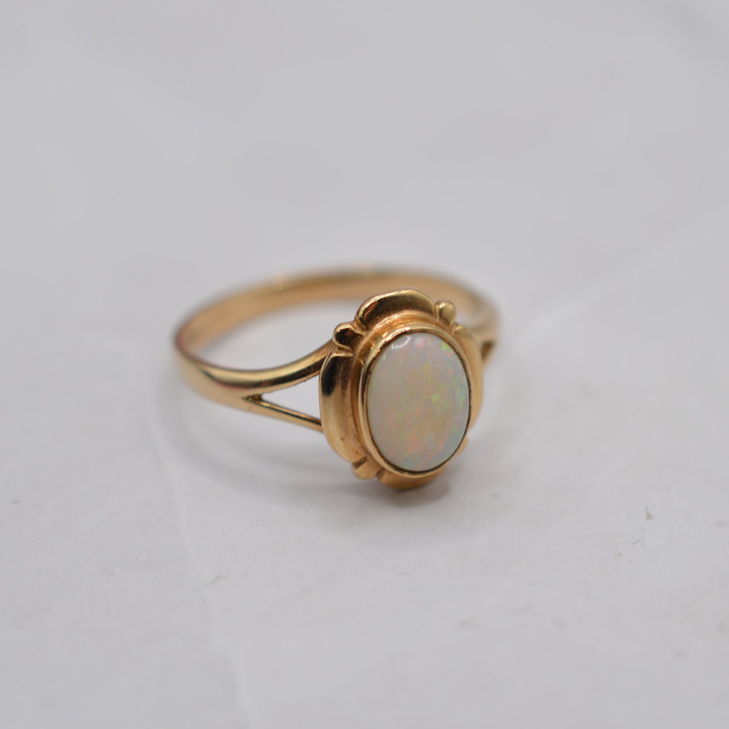 9ct Gold Opal Ring with Art Nouveau–Style Frame