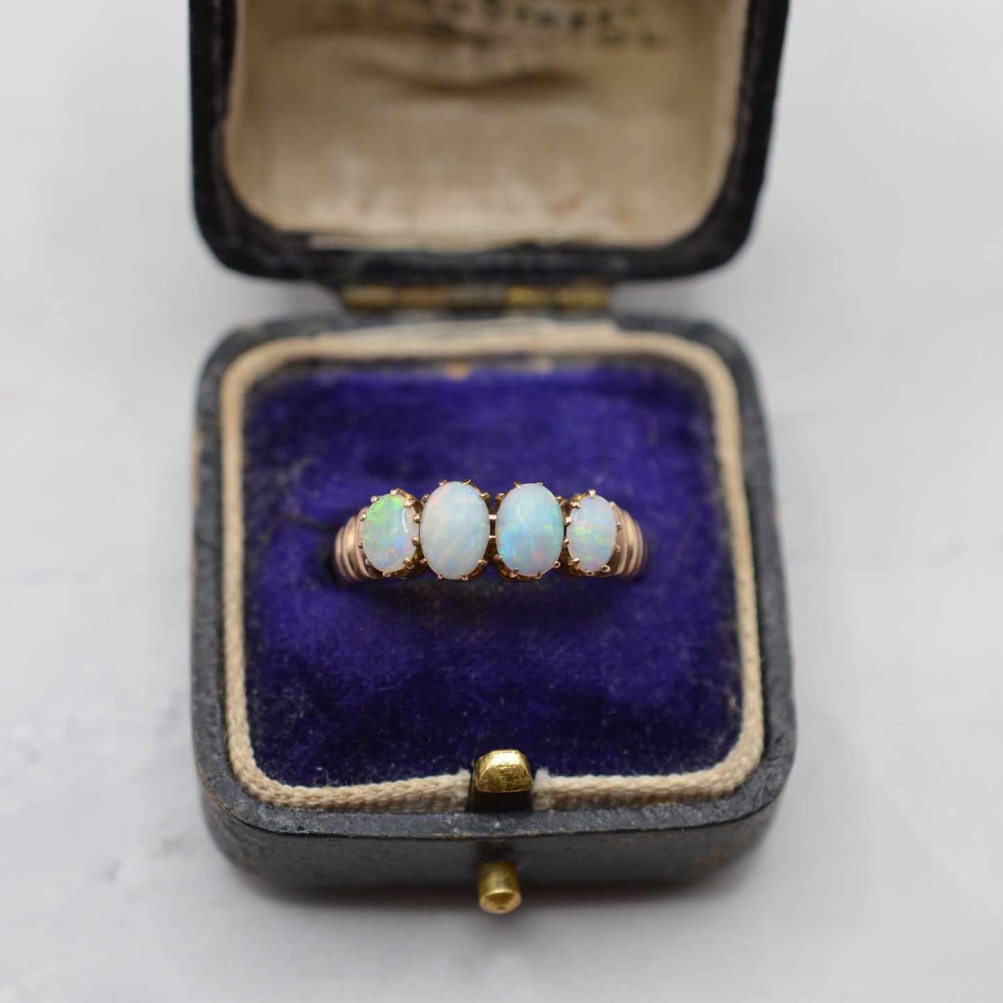 Antique Edwardian 1902 Opal Four-Stone Ring