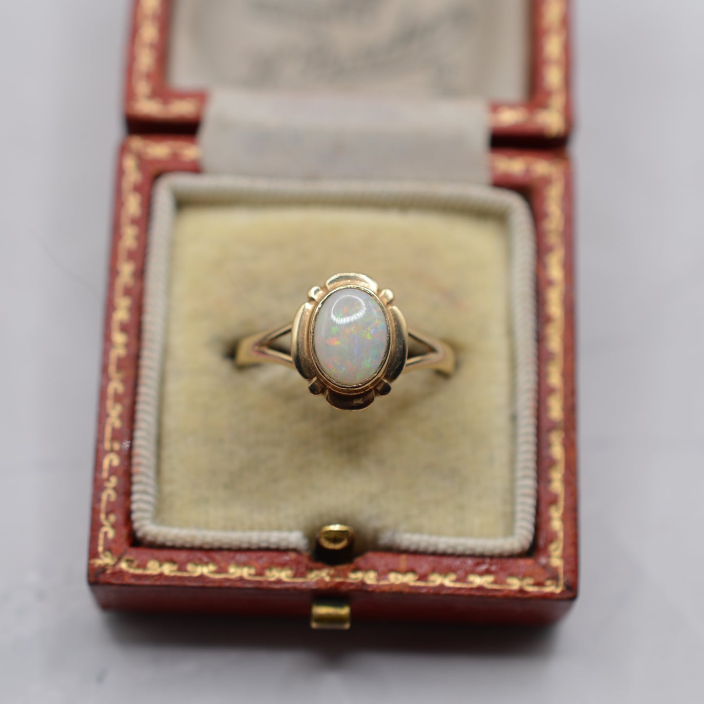 9ct Gold Opal Ring with Art Nouveau–Style Frame