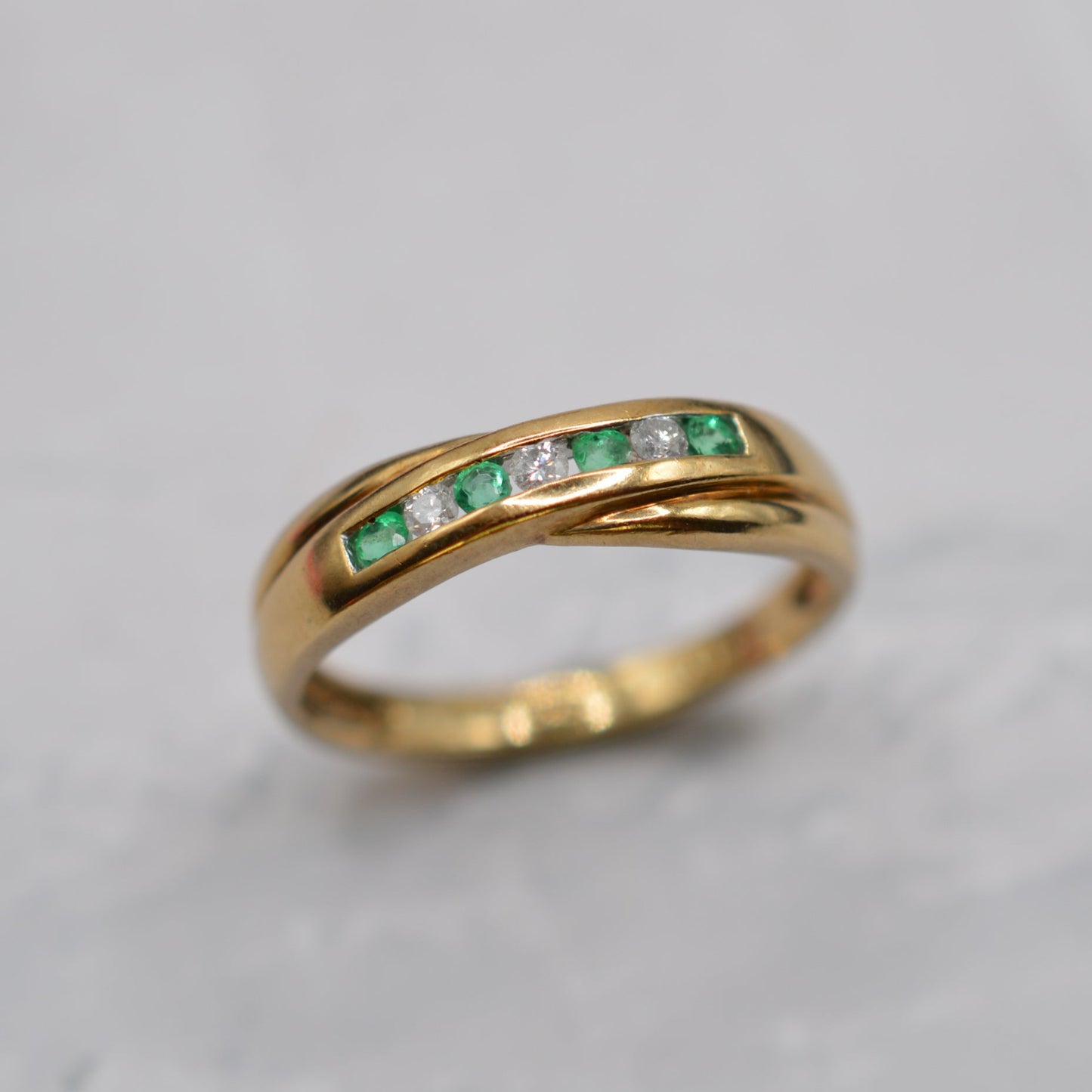 9ct Gold Emerald & Diamond Crossover Half-Eternity Ring
